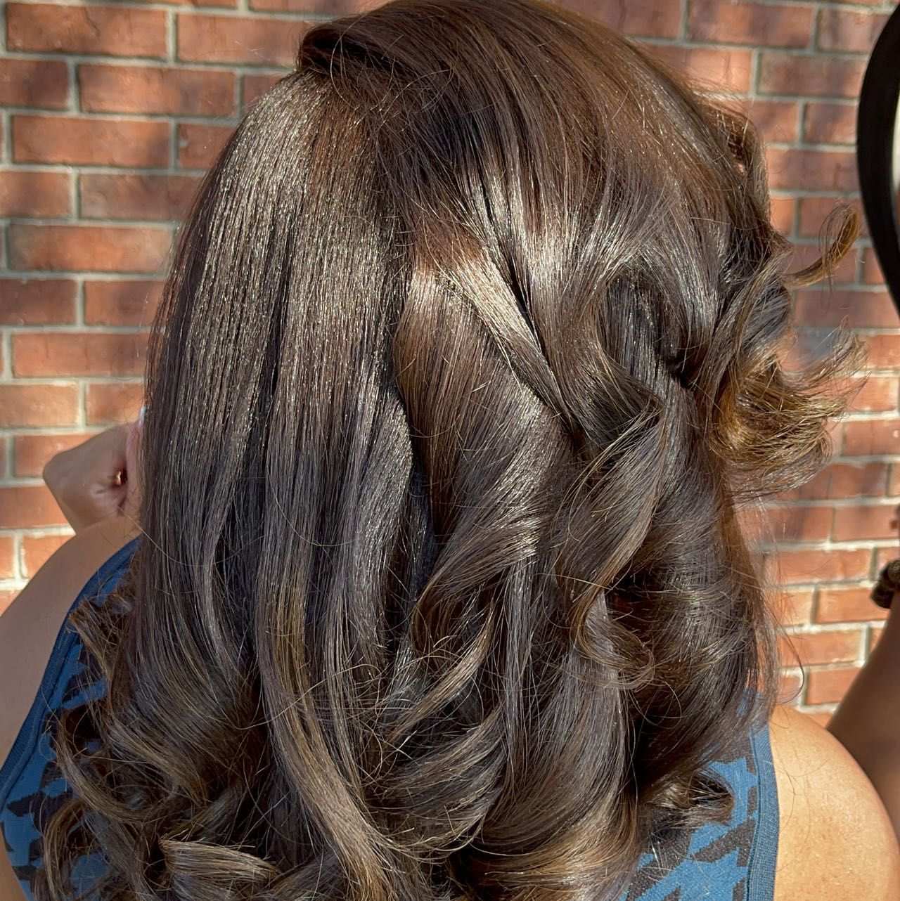 Rich brown silk press waves
